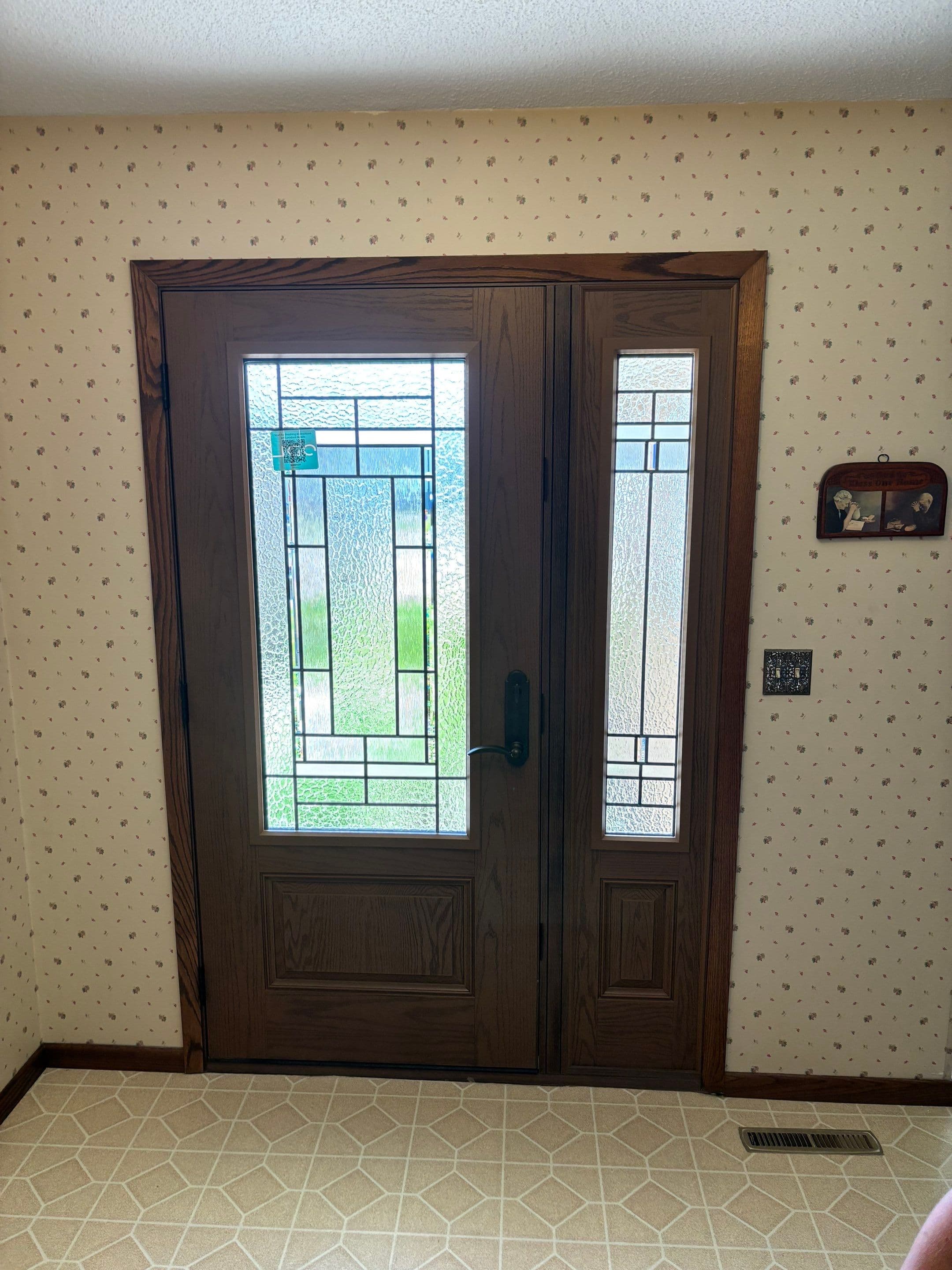 New wood entry door with leaded-glass sidelites, interior view